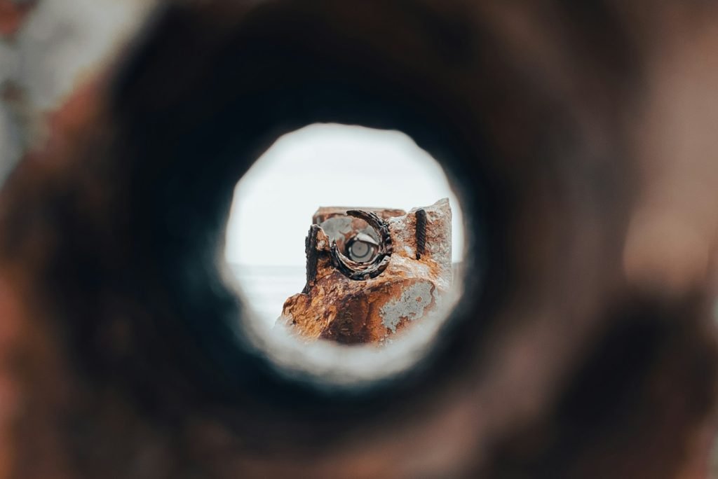 a close up of a metal object with a blurry background